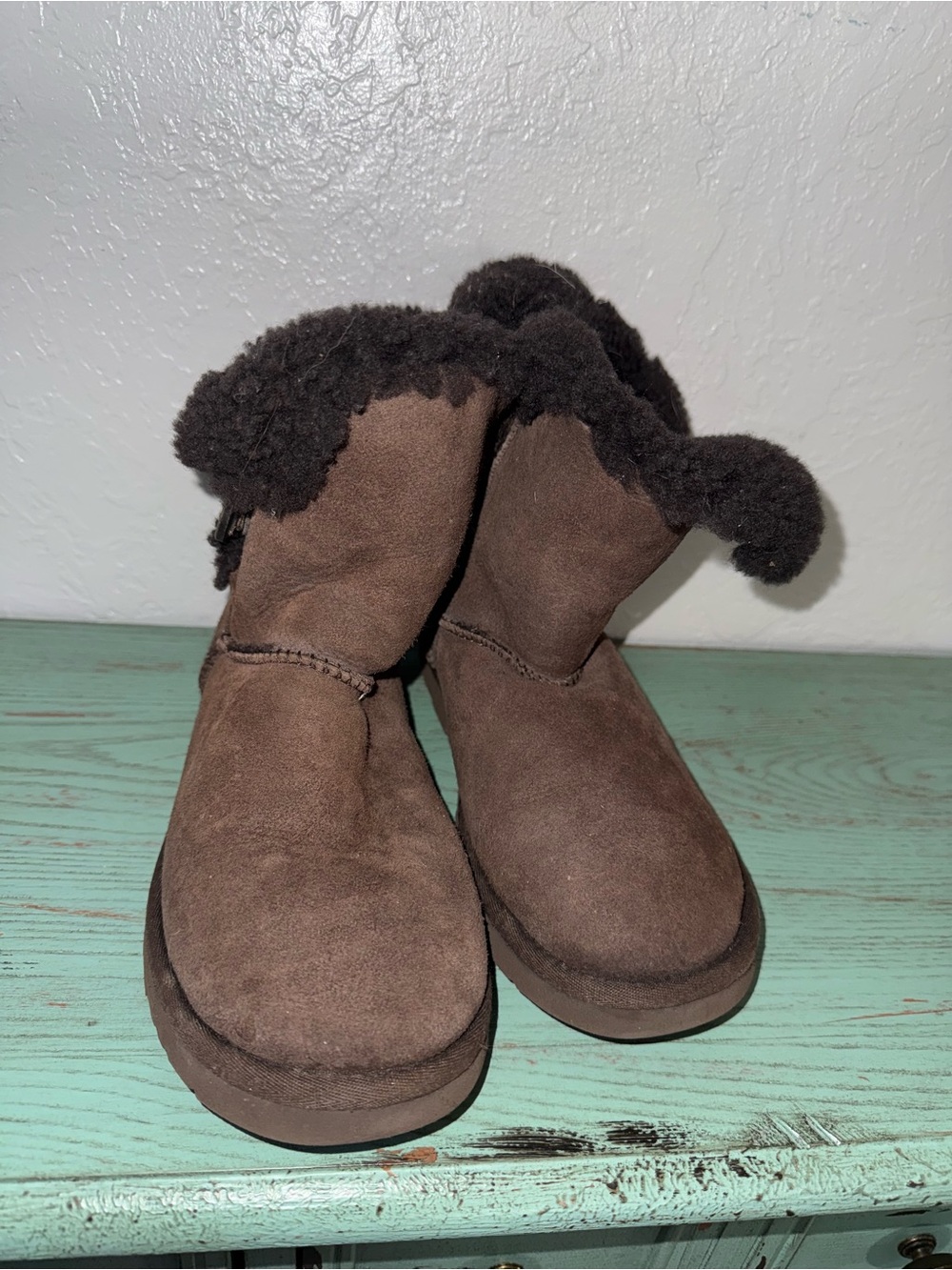 Brown suede UGG Bailey Button boots